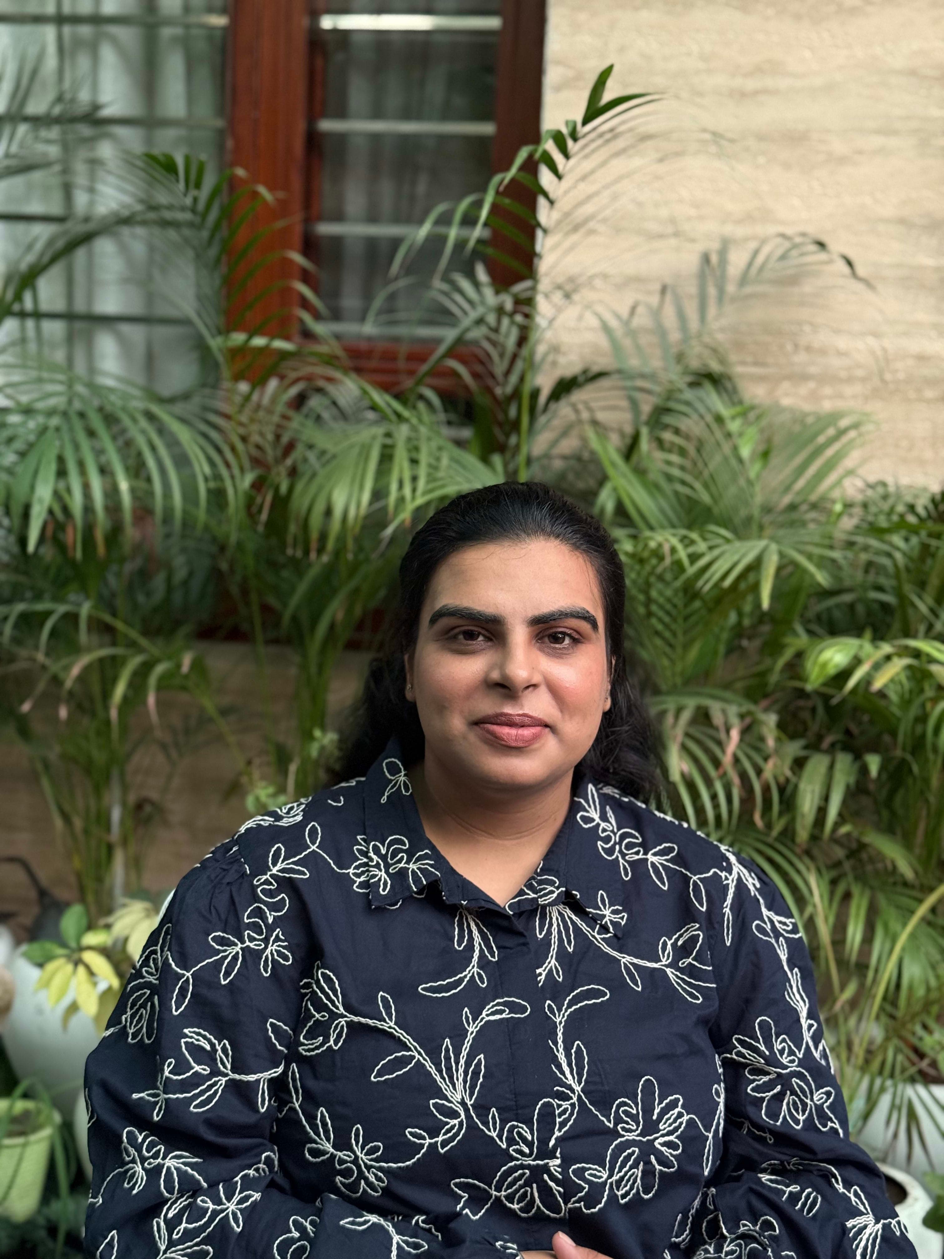 Portrait of Ravneet in a creative studio
